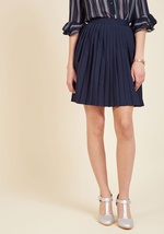 Pleats as Punch A-Line Skirt in Navy by Shaoxing Lidong Trading Co