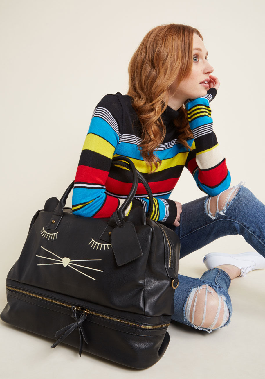 9788C - From the security checkpoint to the airport cafe, your black weekend bag will be met with smiles from all on your route! With its adorable ears, embroidered kitty visage, outrageously spacious interior, comfortable shoulder strap, and handy bottom compart