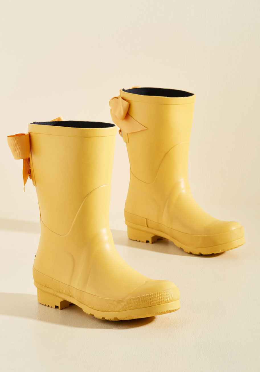 yellow rain boots with bow