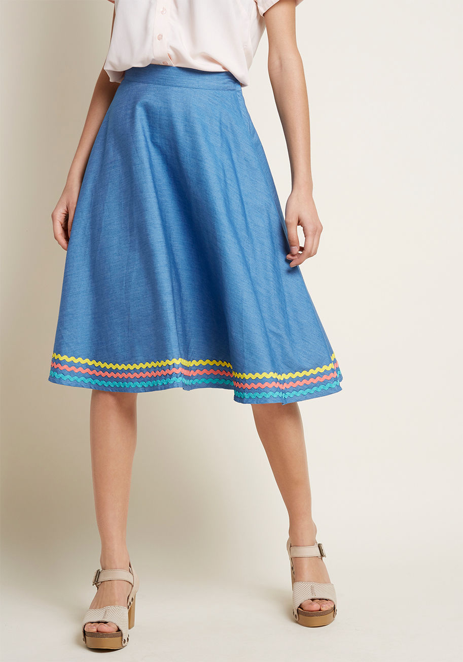 MCB1374 - Donning this chambray skirt for the day instantly brings a smile to your face - and the fun doesn't end there! As you sashay the pocketed, high-waisted silhouette and the yellow, coral, and aqua trimmings of this ModCloth namesake label piece around town,