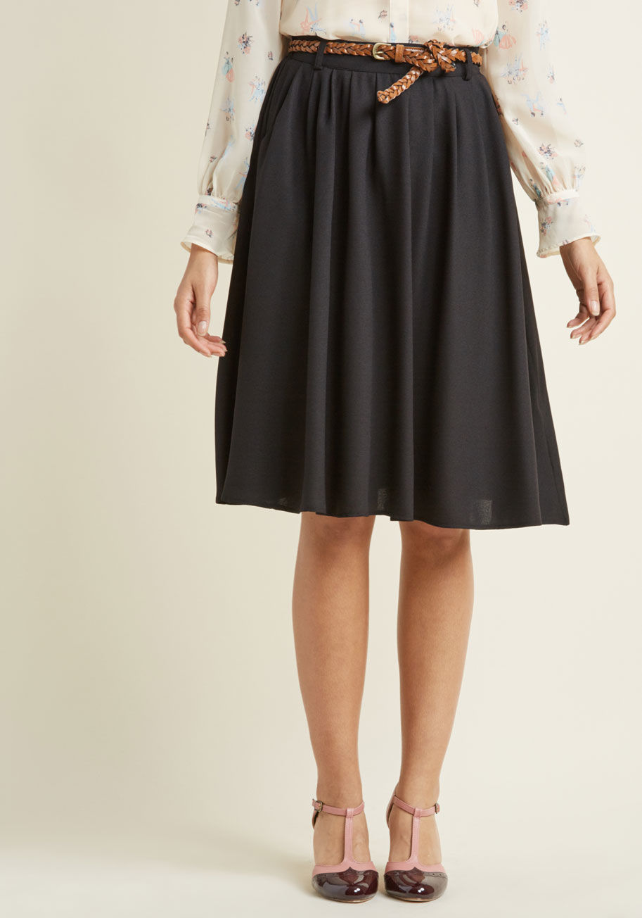 MDB1044 - Match the beauty of your favorite flower petals by opting to flaunt this black midi skirt for the day! Clasp the braided faux-leather belt through the loops that sit along this ModCloth namesake label bottom's fitted-back waistband, slide a hand into one 