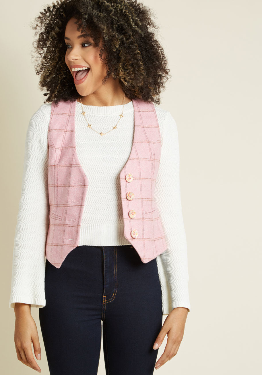 WJ128A - Your dedication to unique ensemble additions is apparent with every wear of this pink vest! Woven from shoulder to hem with a brown plaid pattern, detailed with finished pockets and matching floral buttons, and lined with botanical-patterned satin, this o