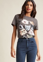 To fully appreciate the feline motif of this graphic tee, one must drop everything they're doing and scope out each visage carefully. Photorealistic cat heads by A9369KAFI