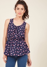 When the dresscode of your workplace is anything but business as usual, this kelly green top will help you fit right by 