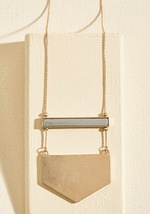 A Game of Give and Shape Necklace by Ana Accessories Inc