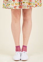 Who'd have thought these purple fishnet socks would garner so much buzz around your outfit? From the way you smile and excitedly handle every inquiry about their frilly cuffs and fresh fishnet construction, it appears as though you were by 