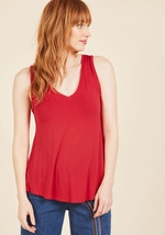 Every fashionista knows the necessity of pieces that can be infinitely styled, and this black tunic promises unlimited options. Opposite its V-neckline, this ModCloth-exclusive tank top hides a hint of sweet style, while its high-low hem and ultra-soft je by MCT1065