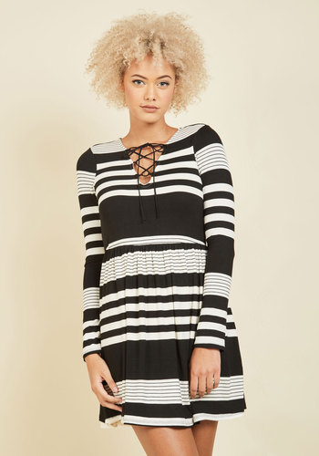 Coffee Shop Reading Long Sleeve Dress in White Stripes by Nexxen Apparel, Inc