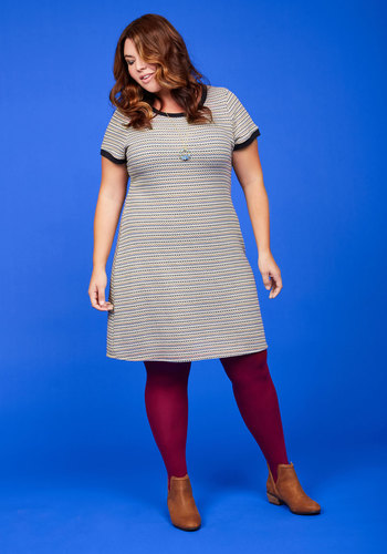 Take One for the Tee Sweater Dress by Nexxen Apparel, Inc