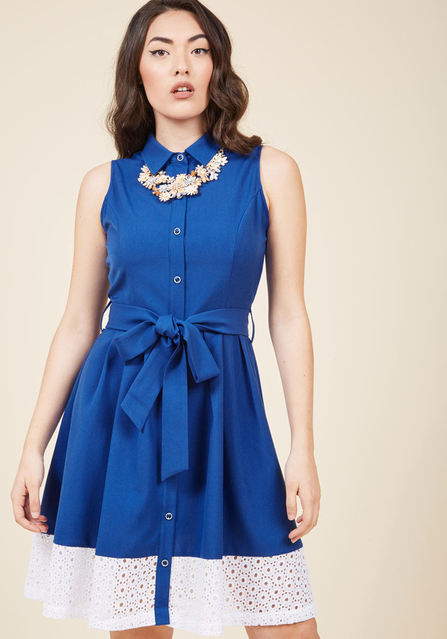  - After working this royal blue shirt dress