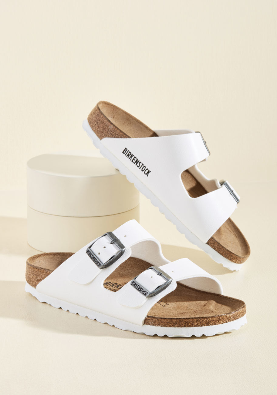  - After your biggest backpacking achievement to date, you deserve to slip out of those hiking boots and rest your feet on the classic beds of these Birkenstock Arizona sandals! Made of these double-strap sandals feature silver buckles, leather lining, and a