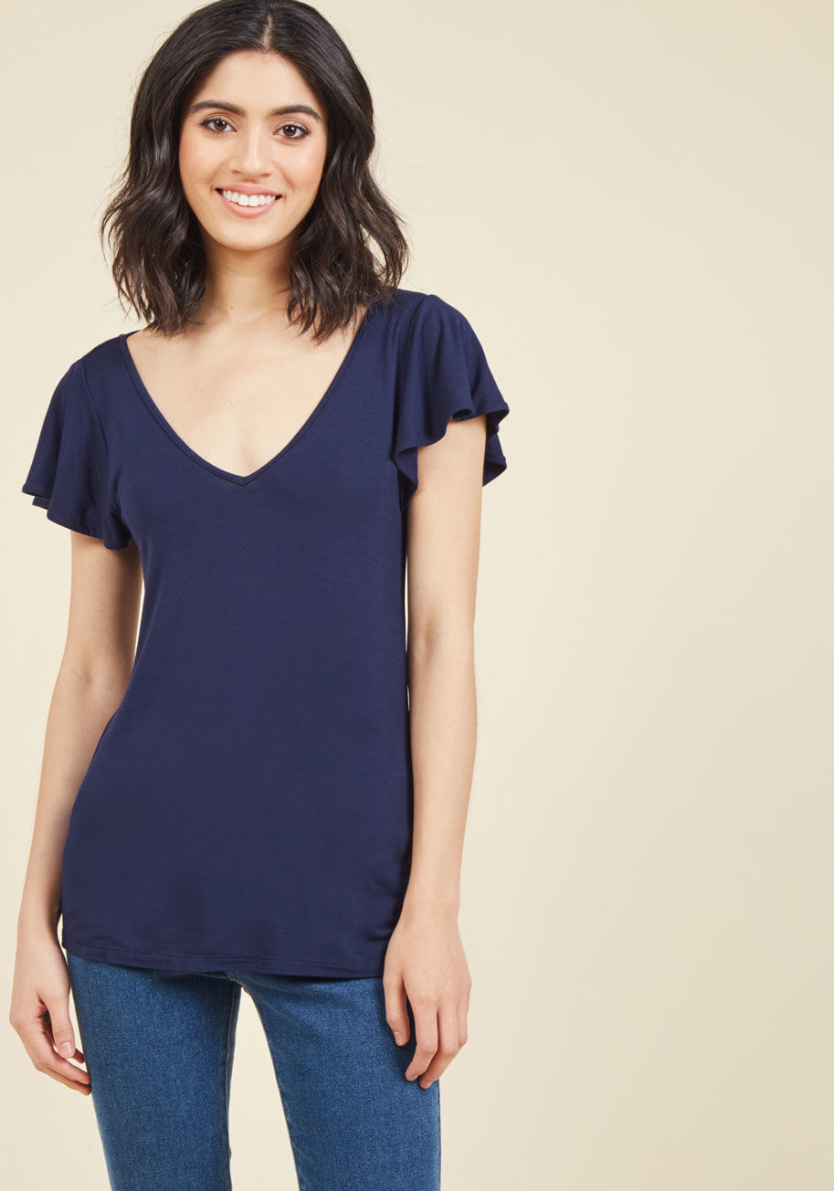  - Amend your date night ensemble so that it includes this navy blue top from our ModCloth namesake label! Romantically fluttery sleeves, an alluring V-neckline, and an up-to-date X-back detail this floral, feminine basic, elevating its soft and comfy knit a