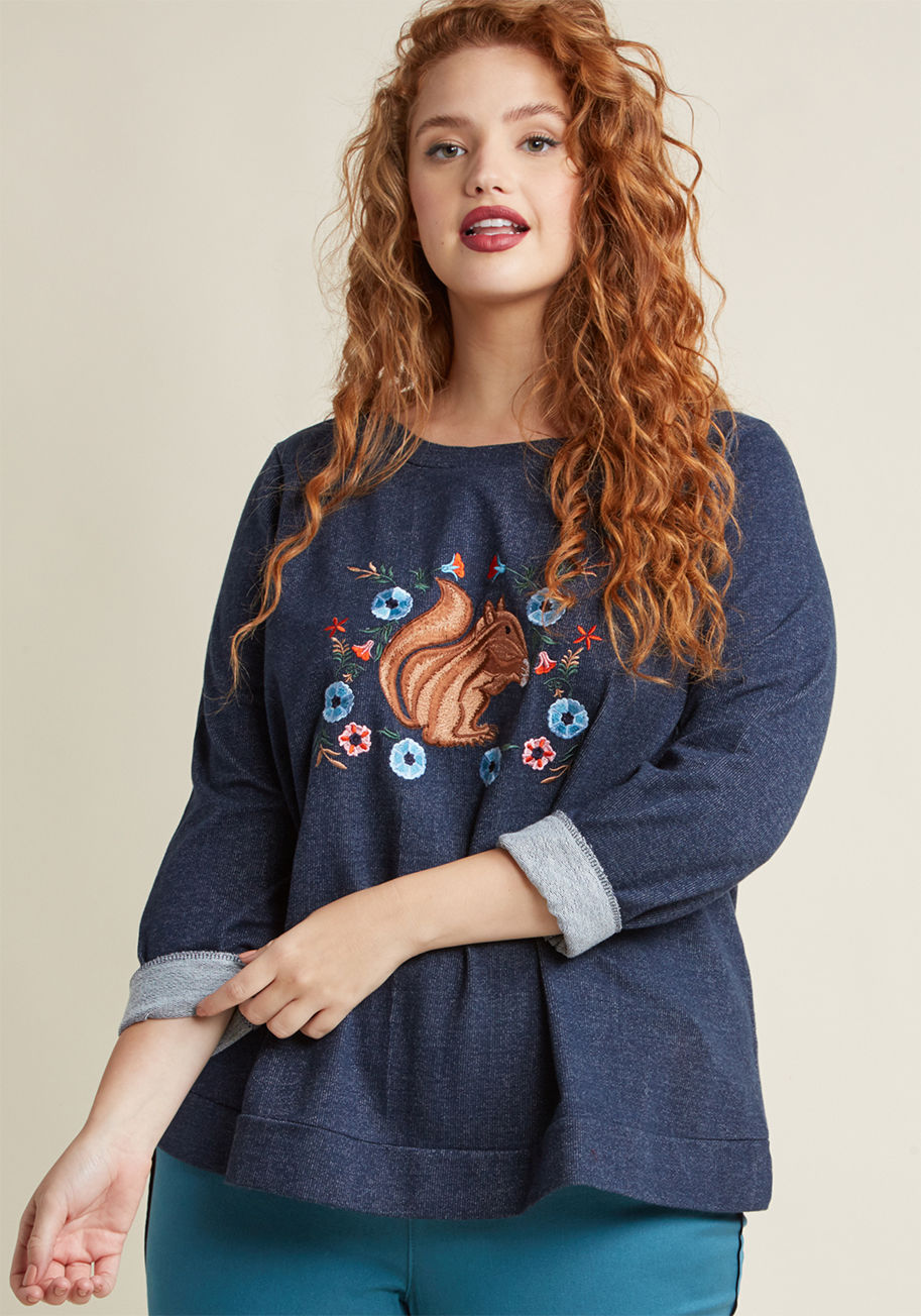  - As an ode to those treasured vintage finds you love to discover so dearly, this embroidered sweatshirt is a cozy retro nod! Part of our ModCloth namesake label, this navy blue pullover displays a sweet li'l squirrel framed by folksy flowers, just waiting 