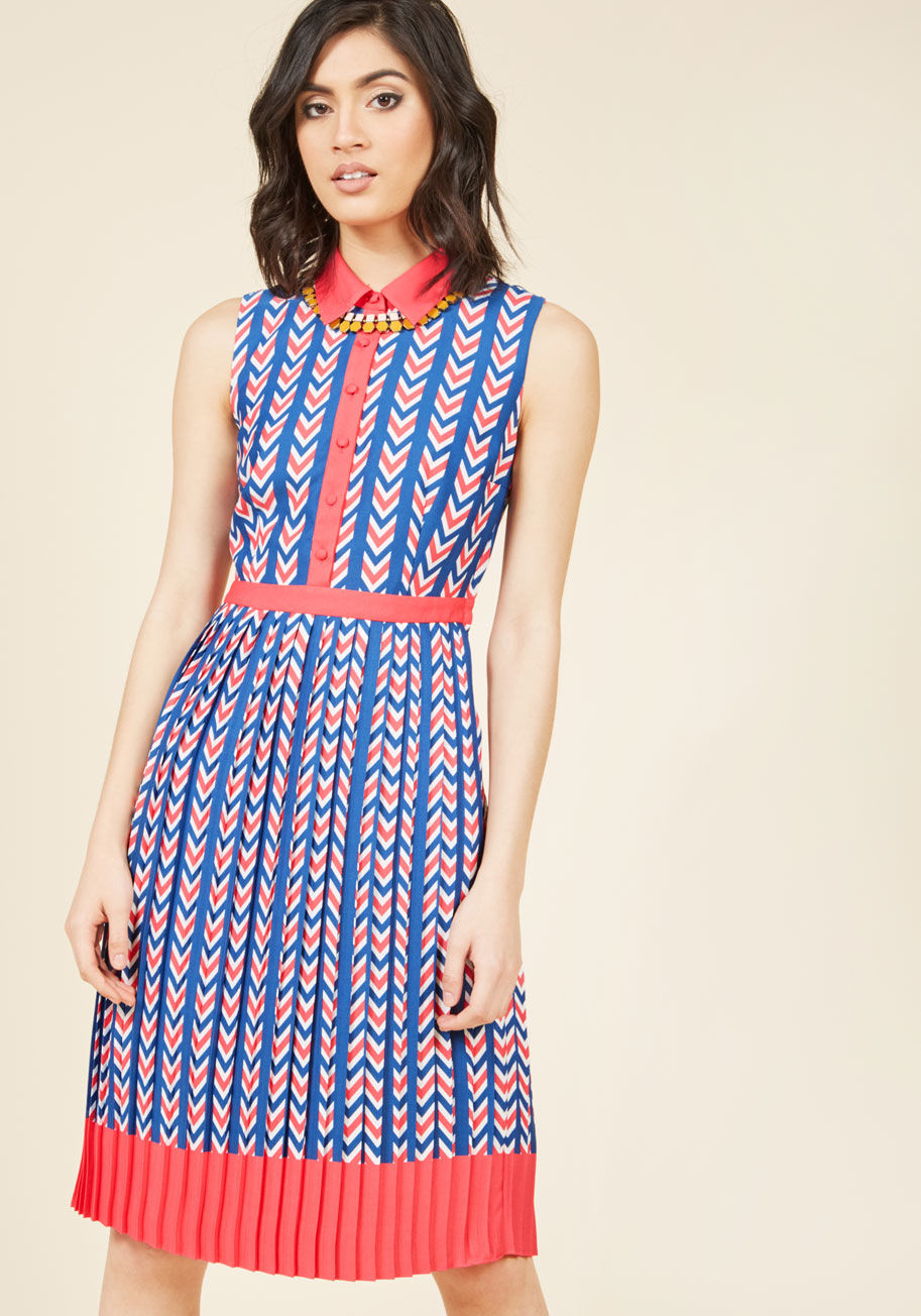  - As eclectic as the memos you transcribe, but as tidy as your organized desk, this retro shirt dress shows your colleagues you mean business! A pocketed part of our ModCloth namesake label, this pleated frock flaunts berry and navy hues, a buttoned bodice,