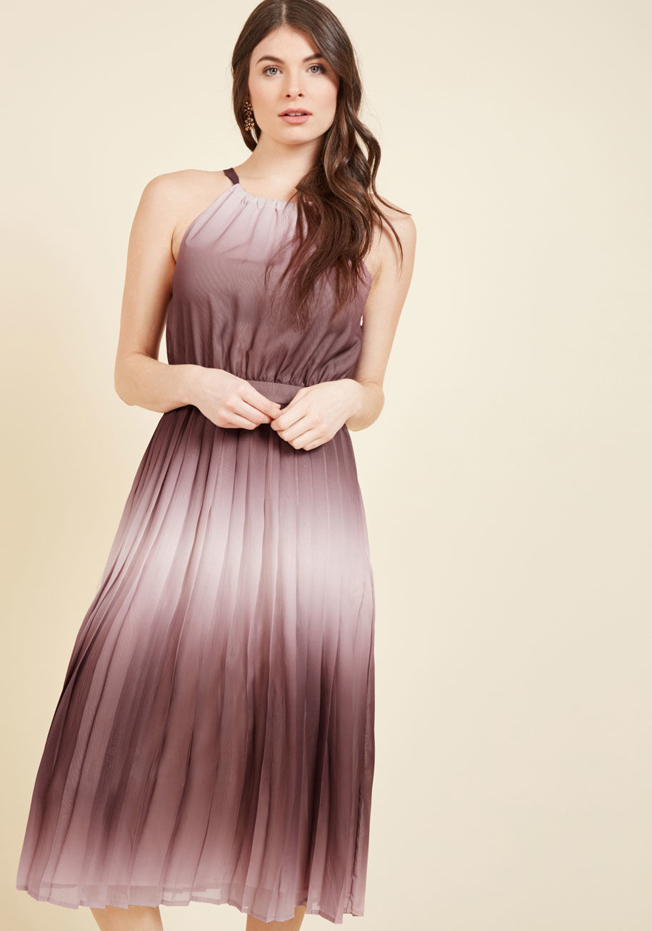  - As elegantly as this long dress oscillates between deep mauve and rose tones, you sway along the faintly waving lakeshore. A quick glimpse of your reflection