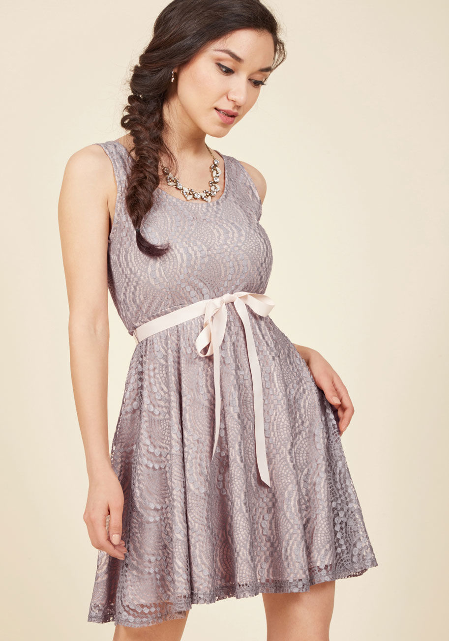 As part of the supporting cast for this celebration of nuptials, you simply can&rsquo;t wait to slip into this lavender lace dress for the rehearsal dinner. It&rsquo;s undeniable that romance is by 