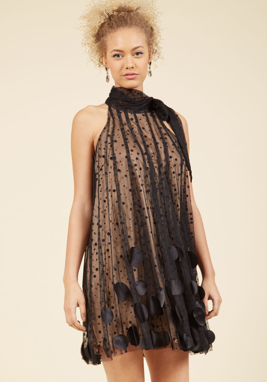  - As your friend smiles her way down the aisle, you cue guests to fill the room with bubbles wearing this swingy shift dress by Ryu. Known for its sophistication and creativity, Ryu has been designing delicate silhouettes with whimsical details since 2008. 