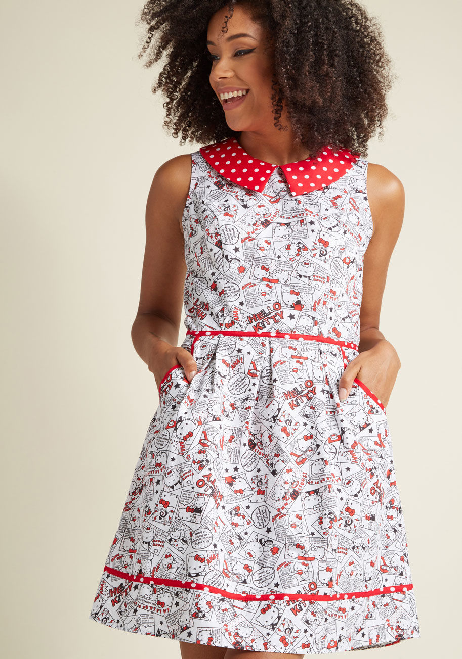  - As your guests arrive at your dinner party, they&rsquo;ll have to try not to lose their heads over this quirky dress! Embellished with a comic-style print of the Sanrio star herself, this cotton frock brings a fun vibe to a classic cut. Finished with a do