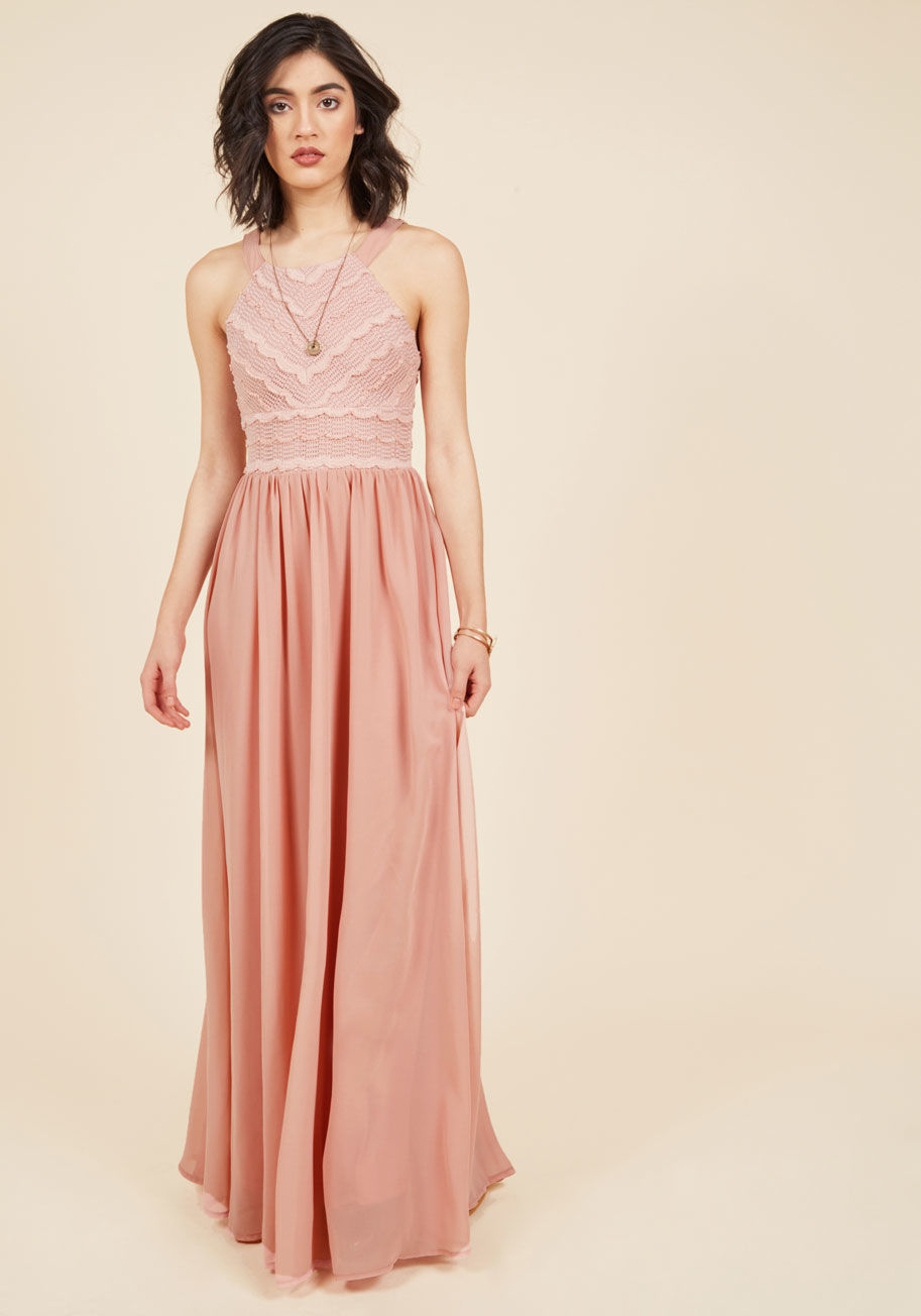  - Breeze into this rose pink maxi dress and let the selfies begin! There are so many details of this romantic gown to document - its tapered shoulders, scalloped bodice, exposed back zipper, and gathered waist all make epic close-up shots that your fashiona