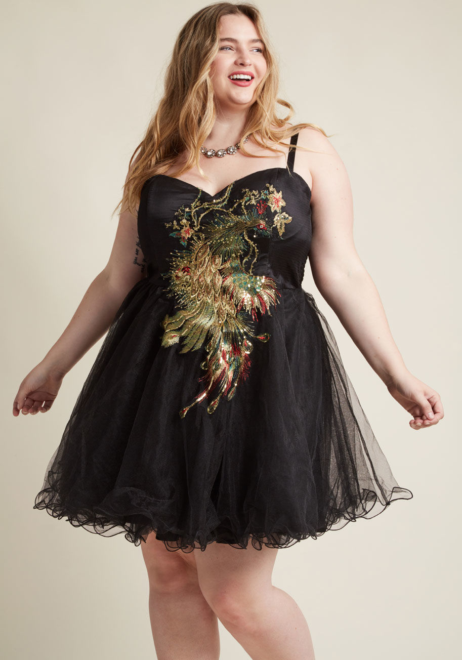 Caminita&rsquo; down the dance floor with perfect poise, just like the graceful garland of blooms embellished on this ModCloth-exclusive, black party dress by Chi Chi London. This frock features a lettuce-style hem and a chiffon overlay skirt that twirls  by 