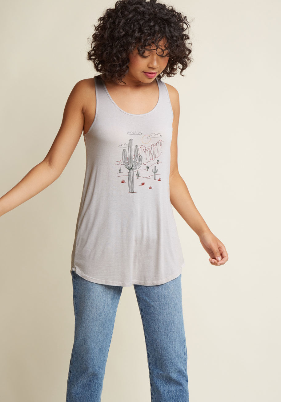  - Channel the blissful quiet of the desert at sunrise simply by sporting this taupe tank top! This ModCloth exclusive's comfy jersey knit, flattering scoop neckline, and green-and-red desert scene will set the tone for a sweet day ahead.