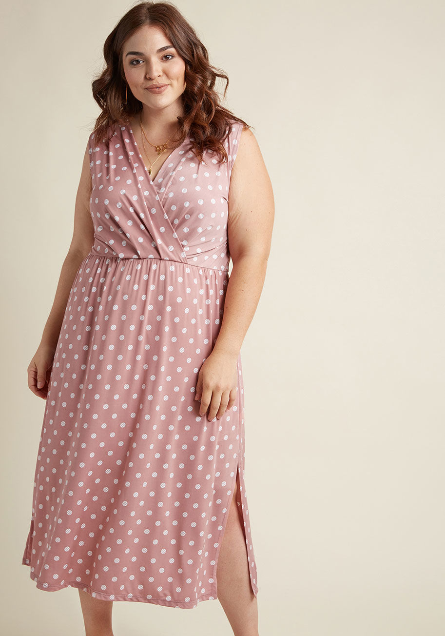  - Combat the blues of complex commutes with the energy this mauve dress inspires! Practical for long flights with its wrinkle-resistant knit fabric, and styled to go from aisle seat to afternoon meeting with a surplice neckline and white-dotted print, this 