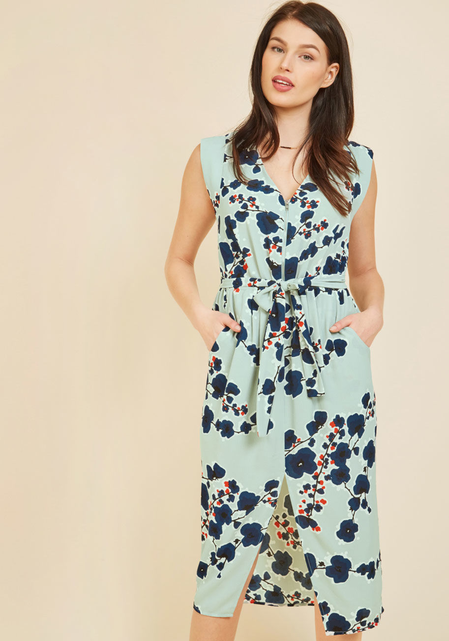  - Days spent volunteering call for a polished look that's both functional and comfortable. This mint midi dress - with its zippered bodice, navy floral print, pockets, and vented skirt - is an excellent fit for your lifestyle of kindness and care, and is th