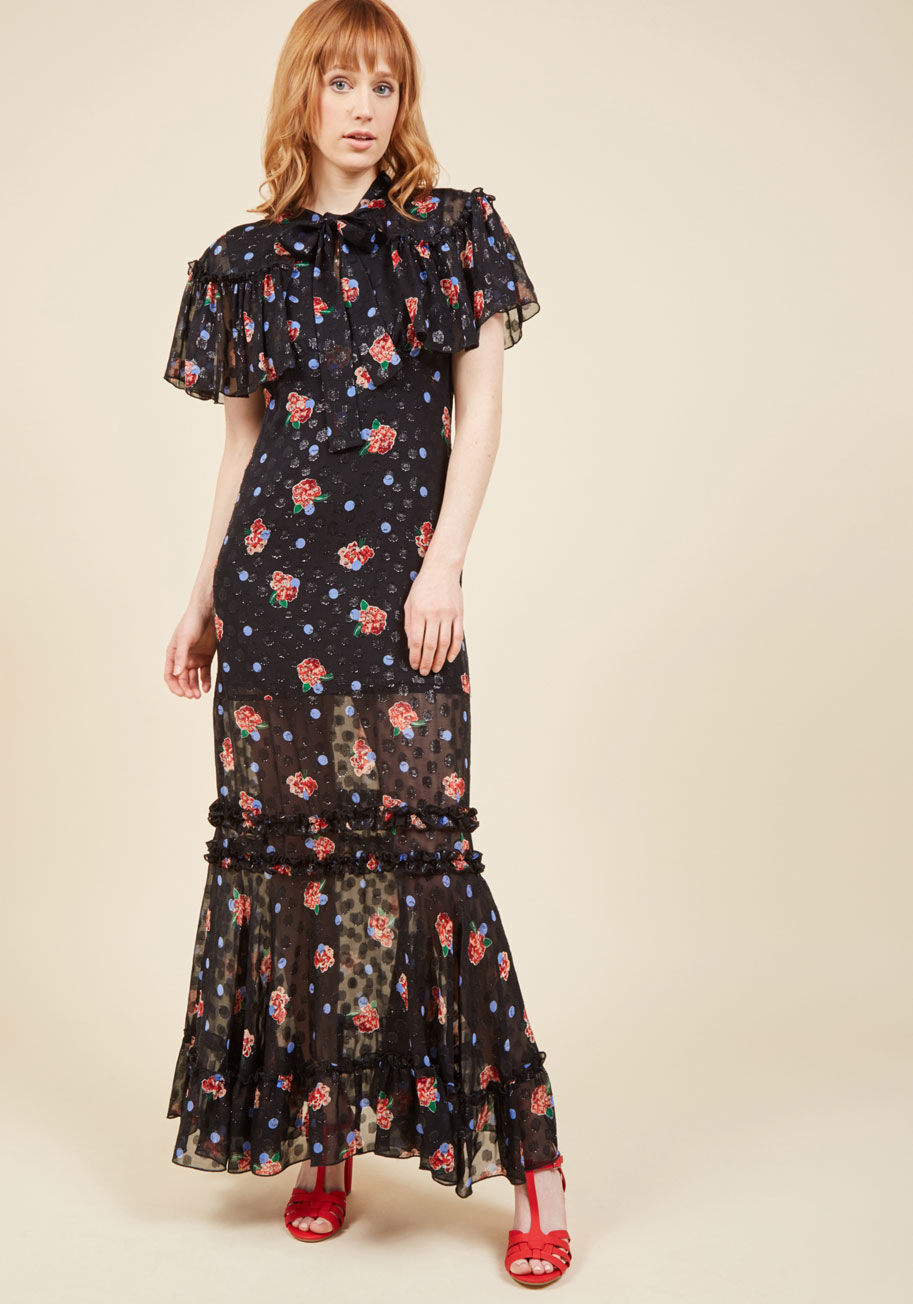  - Debut this Anna Sui maxi dress anywhere from the gala to the wine bar to the gallery opening - it's your choice! Flaunting a tied neckline, fluttery caped shoulders, and a ruffled hemline, this chiffon piece makes a bewitching statement. Add