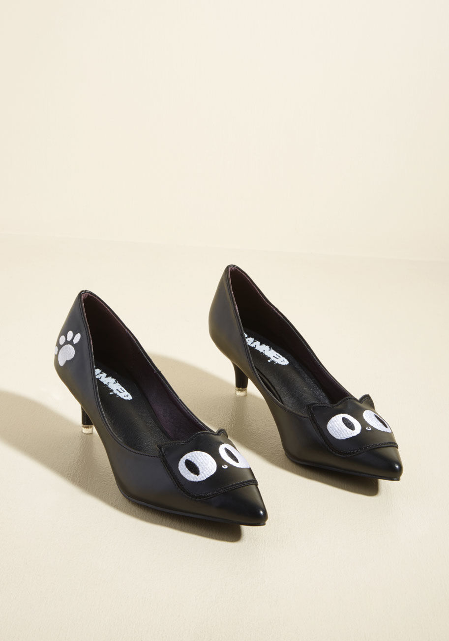  - Did somebody say 'kitten heels with kitten faces'? A pair like these faux-leather kicks from Banned almost seems too quirky to be true! White cat visages and matching paw print embroidery reinterpret the walkable, wearable, pointed-toe silhouette of these