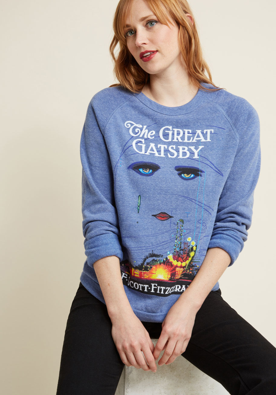 - Do you daydream about your favorite books and beloved fashions to pass the time? If your answer is a resounding yes, you'll surely adore this ultra-soft grey sweatshirt from Out of Print, which depicts the cover of the French children's book classic, Le P