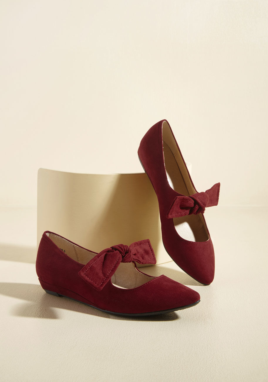  - Equal parts sassy and classy is just how you like your footwear, meaning you're sure to adore these burgundy wedges! Outfitted with knotted straps and chic pointed toes, these faux-suede Mary Janes cater right to your sophisticated specifications.