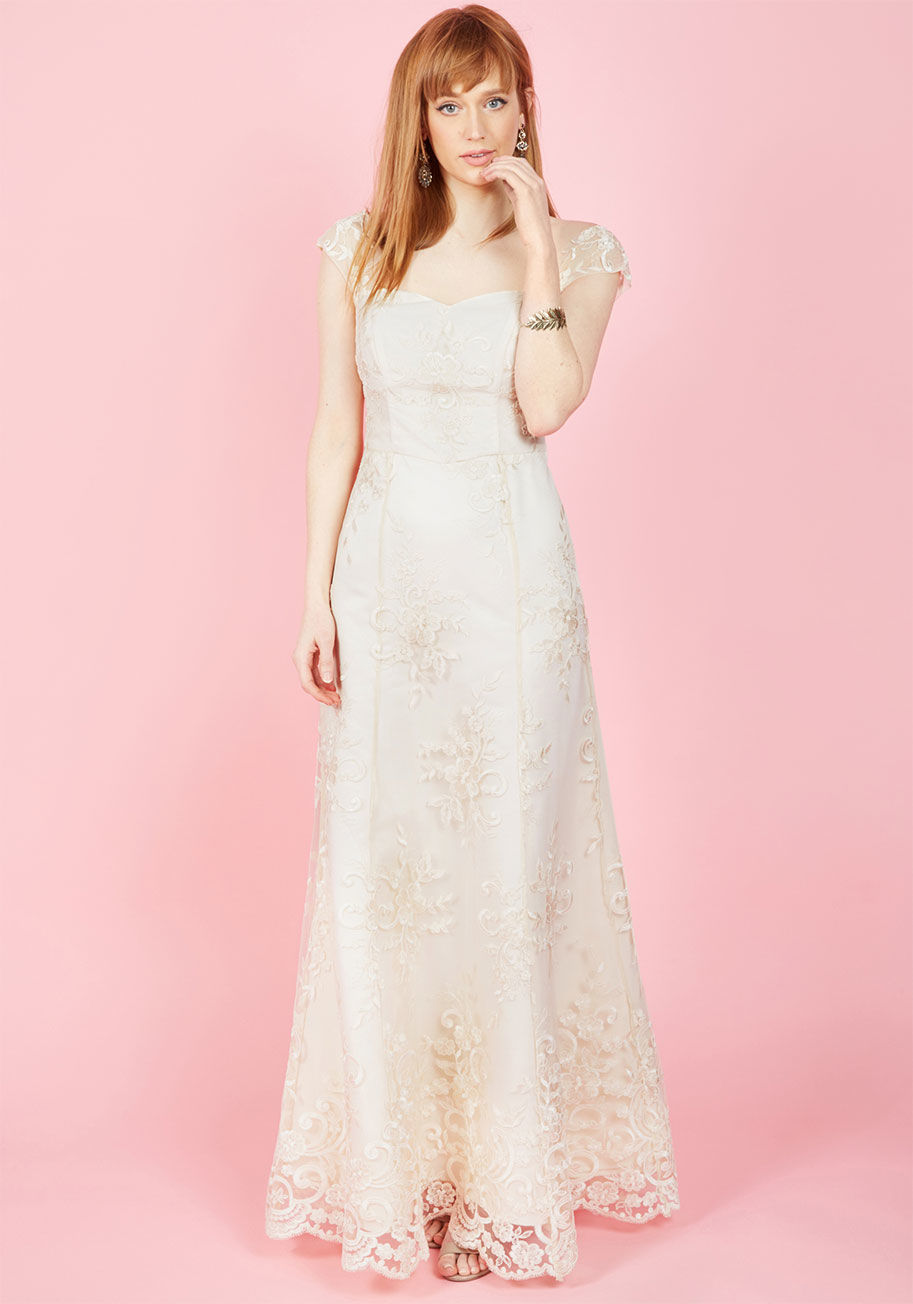  - Every accent of this ivory gown feels like a celebration of your refined style perspective! Lace, off-the-shoulder accents rest above the scooped back of this stunning dress from our ModCloth namesake label, as bountiful embroidery and flattering vertical