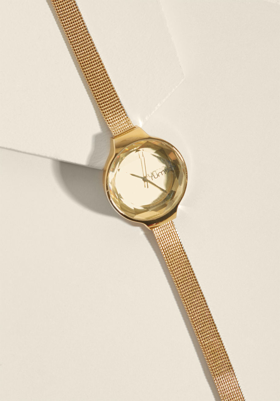 Every aspect of an ensemble is of utmost importance. Attend to the particulars of your outfit by wearing this black watch as the finishing touch. A slim strap affixes this rose gold piece by RumbaTime to your wrist, while a delicate, smoky, and fashionabl by 