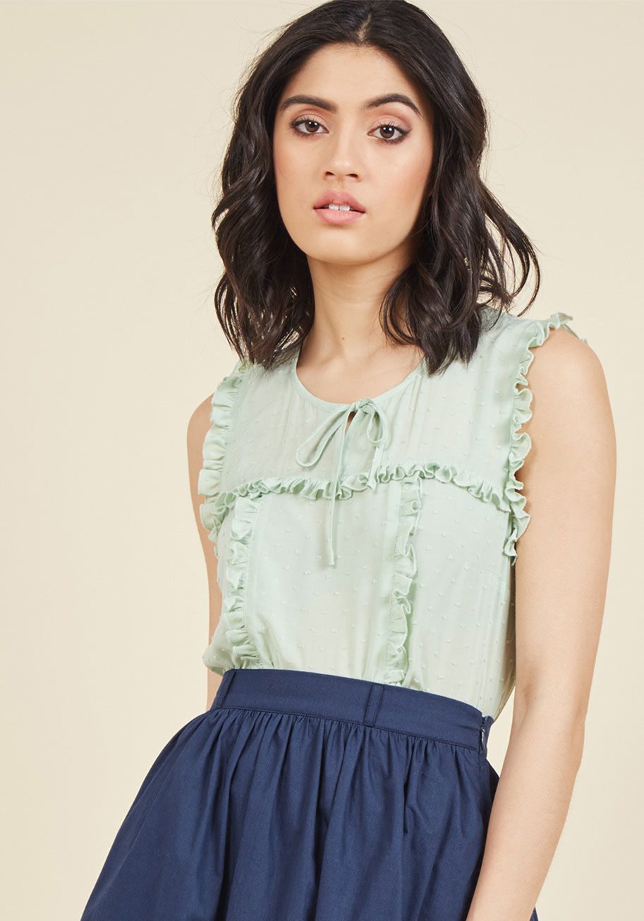  - Every detail of this mint green blouse from our ModCloth namesake label was carefully chosen and crafted for your flaunting pleasure! Made soft and feminine with a neckline tie, clever clip dots, and ruffles from shoulder to hem, this gorgeous blouse high