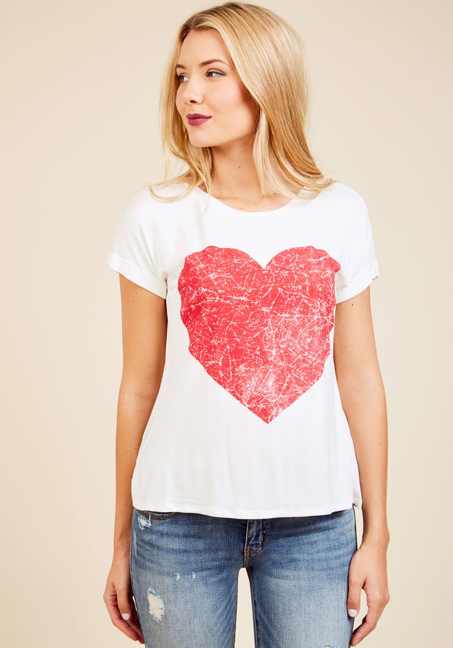  - Everyone who catches a glimpse of the bold red heart on your ivory tee will concede that they concur with its expression of love! Living up the distressed screen print, cuffed short sleeves, and soft knit of this comfy, ModCloth-exclusive shirt, you celeb