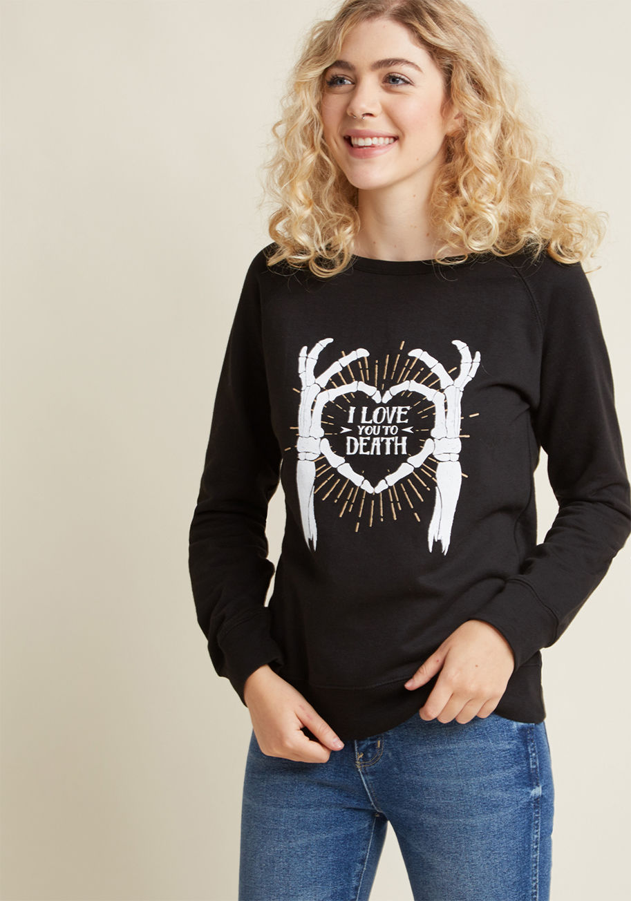  - Everyone you encounter while wearing this black pullover will feel awfully flattered by the message it so boldly displays! Skeleton hands frame a phrase of total admiration atop this wide-neck sweatshirt, giving your look a macabre twist you're proud to f