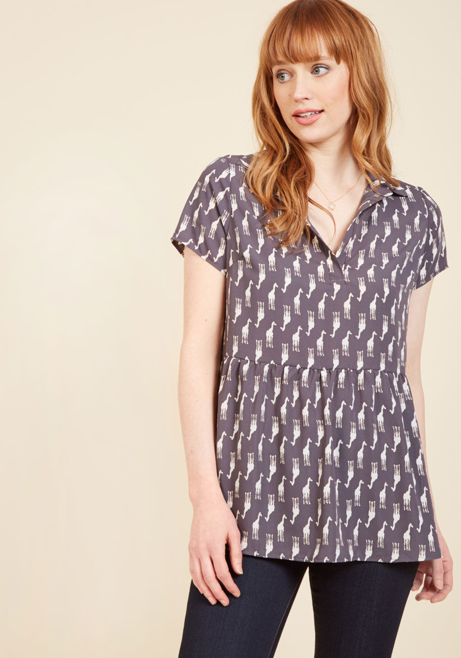  - For a morning at the coffee shop, an afternoon of errands, or even a day at the office, this peplum blouse is perfectly suited! Given its polish by a collared, notched neckline and its personality with its ivory giraffe silhouette pattern, this flowy top 