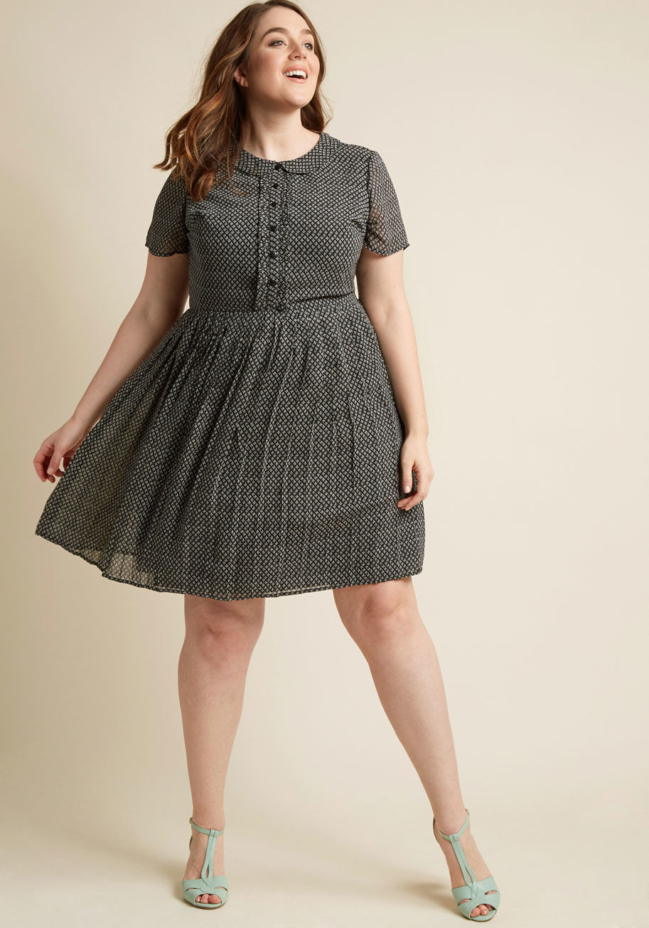  - For school, work, brunch, and beyond, this black shirt dress - a ModCloth exclusive - is your wardrobe's best asset! Smart details like a Peter Pan collar and pleated skirt play well with the festive white floral pattern and ruffles flanking its decorativ