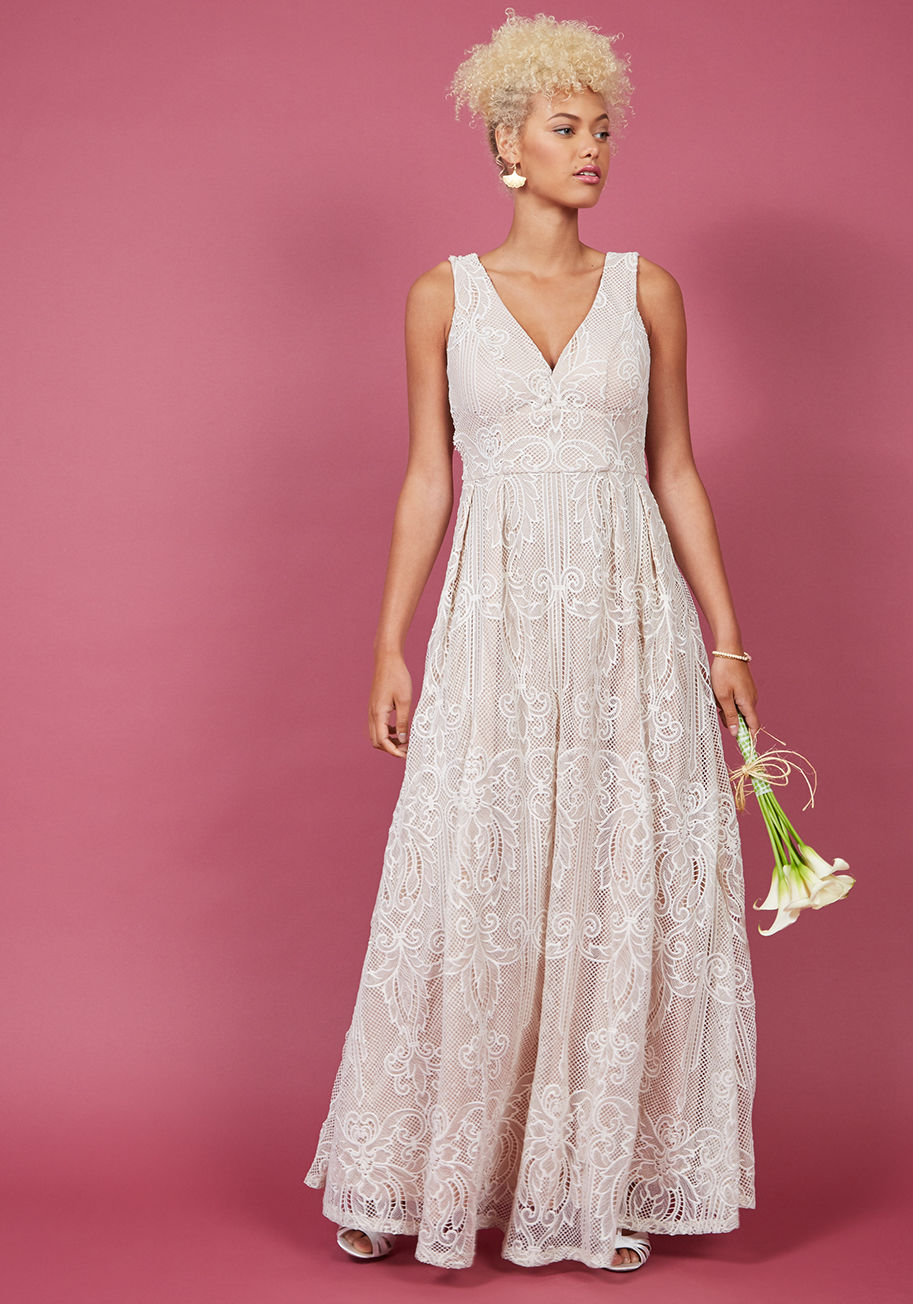  - For your most opulent occasions, rely on this white lace maxi dress to bestow all the elegance expected - and then some! Detailed with a sophisticated notched neckline, princess seams, and a full skirt highlighted by a beige underlay, this ModCloth-exclus