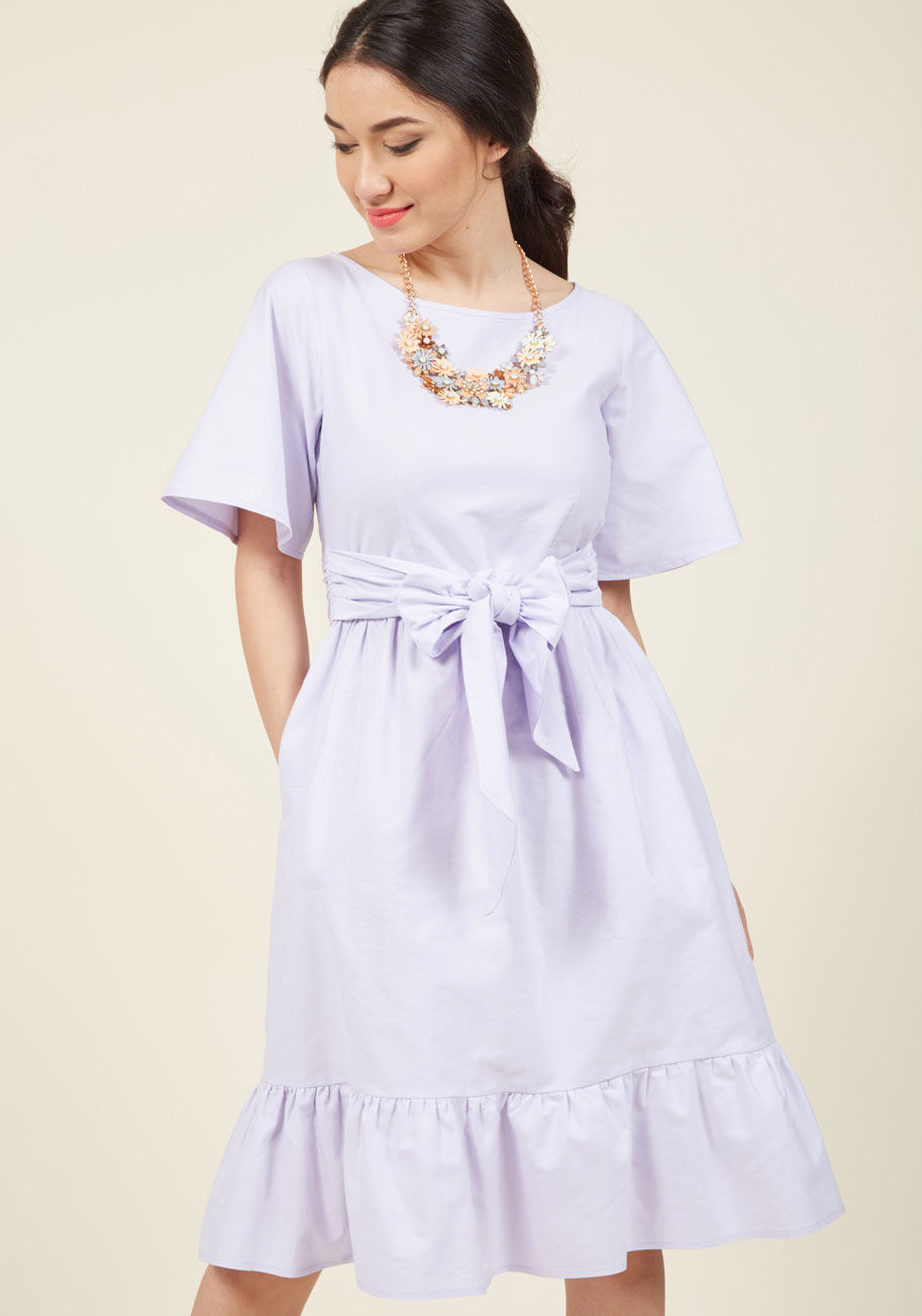  - Friends admire you for your dignity and grace, which you further flaunt using this feminine midi dress from Closet London! The tailored bodice, gathered-and-tied waist, and hidden pockets of this cotton frock exude minimalism, while its belled half sleeve
