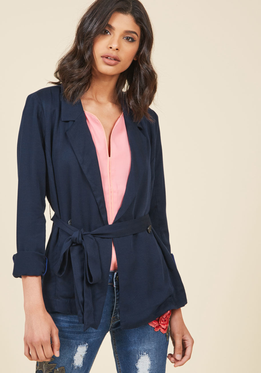 From days at the office to nights on the town, this navy drape blazer feels absolutely 'you' through and through. Finished pockets, double-breasted buttons, and a waist-cinching sash all contribute to the authentic feel of this ModCloth namesake label lay by 