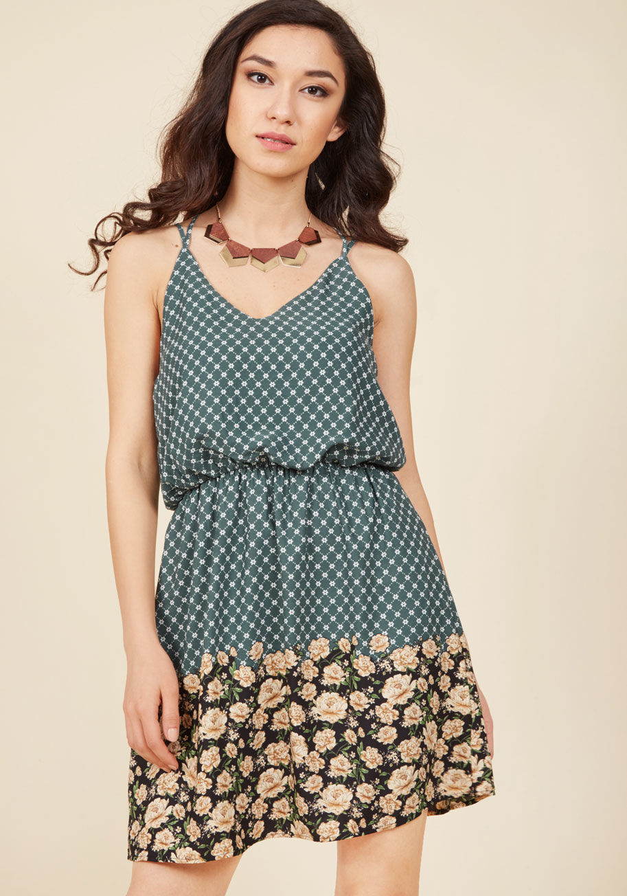  - From the ice cream parlor to the sculpture garden, the free concert to the lookout point, this teal sundress will style your day off escapades! Flaunting a white pattern that spans from its double-strap racerback to its skirt - which is bordered with a bl
