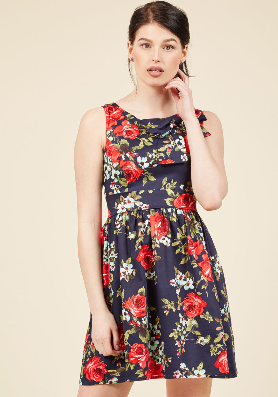  - From Washington to Wilkes-Barre, Allentown to Aliquippa, everyone&rsquo;s talking about your charming floral dress! Flaunting red dots and adorned with a darling bow, this cotton-blend fit and flare has you - and your neighbors - dancing with joy.