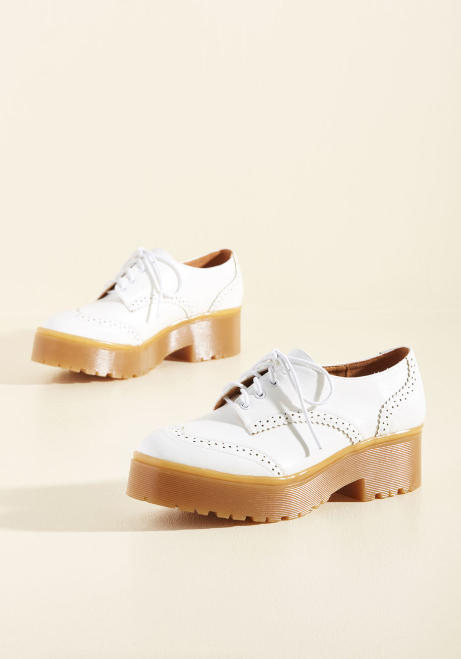  - Have your bestie watch your stuff while you step into the spotlight to strut these far-out white flatforms! The faux-leather uppers of these ModCloth exclusives flaunt menswear-inspired wingtips, and their gumsole platforms are treaded to edgy perfection.
