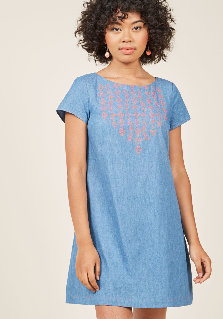  - Hello, sunny day! This chambray mini dress from our ModCloth namesake label is exactly what a bright afternoon calls for. Touting a triple-buttoned keyhole, coral florals embroidered into the yoke, and secret pockets, this short-sleeved shift shares your 