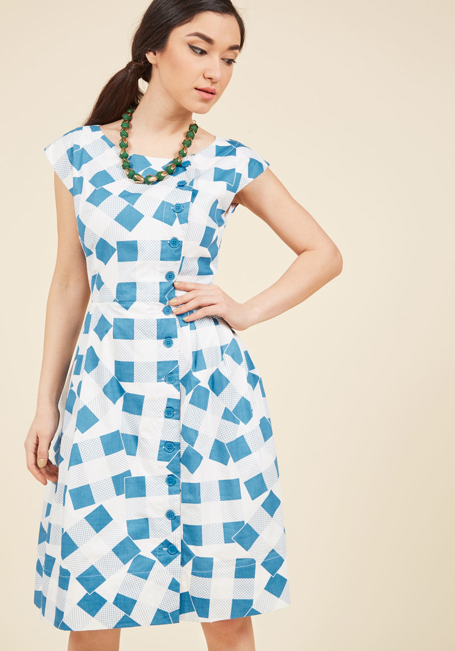  - Highlight the allure of your personality with this blue and white dress from Emily and Fin! It&rsquo;s said that you shouldn&rsquo;t judge a book by its cover, but when you&rsquo;re clad