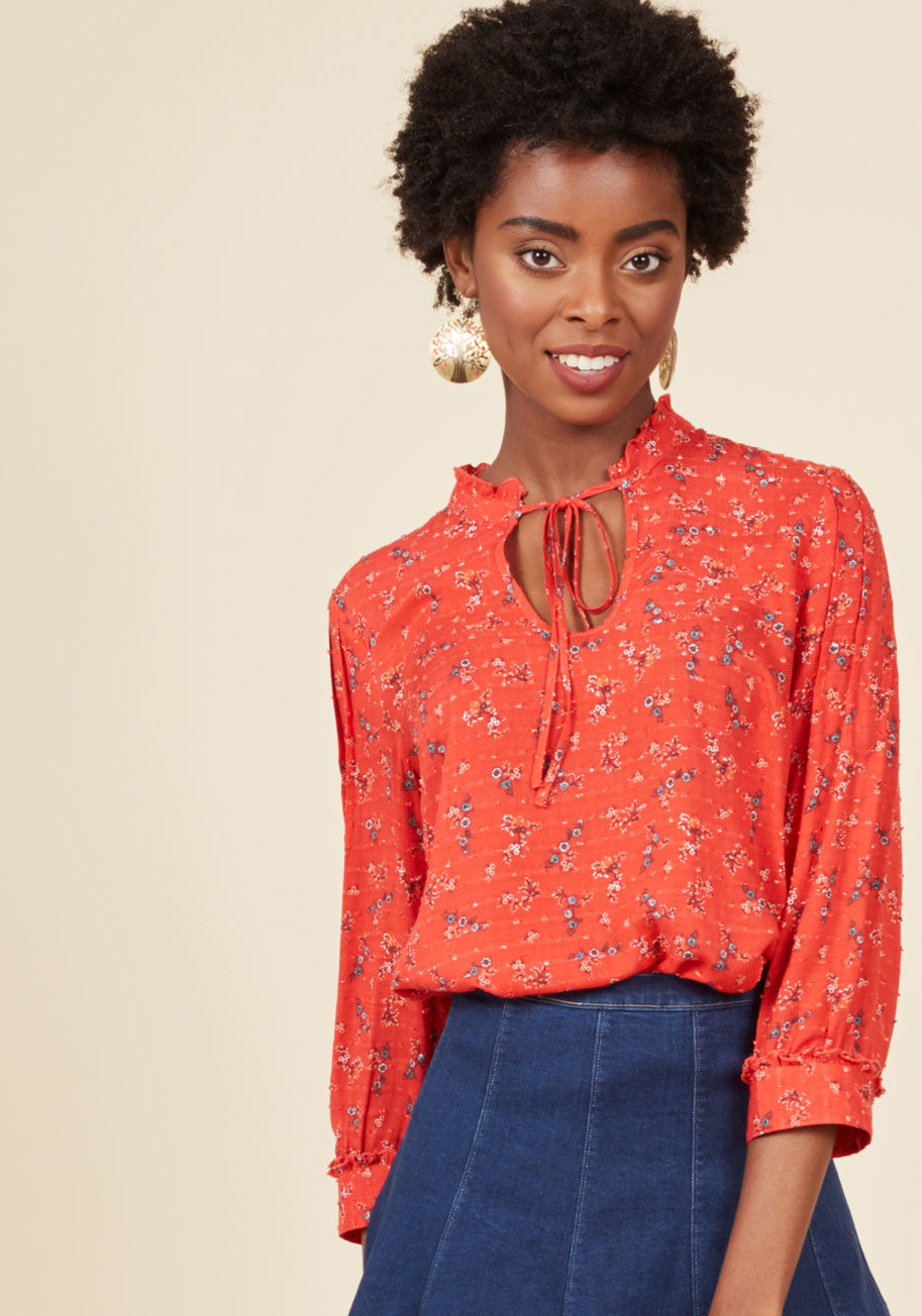  - If pastoral style makes you smile, then this red blouse from our ModCloth namesake label is guaranteed to make you beam! A ruffled motif details the neckline and 3/4-sleeve cuffs of this tied-neckline beauty, as textured dots and a delicate floral print r