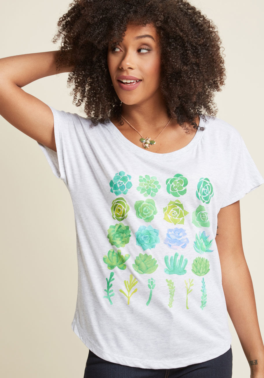  - If you, like us, desire an existence brimming with plants, then this pale grey tee is perfect for you. This ModCloth exclusive is designed with a wide neckline, dolman short sleeves, and a perfectly organized screen print of watercolor succulents. Livin' 