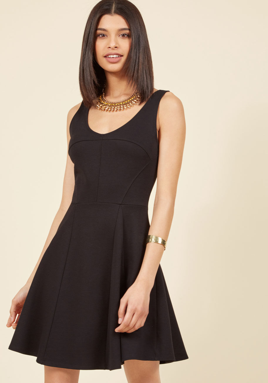  - In the mood for a change of scenery, you don this black dress and head downtown to meet your pals for the evening! From the top-floor restaurant to the chic wine bar, you lead the way