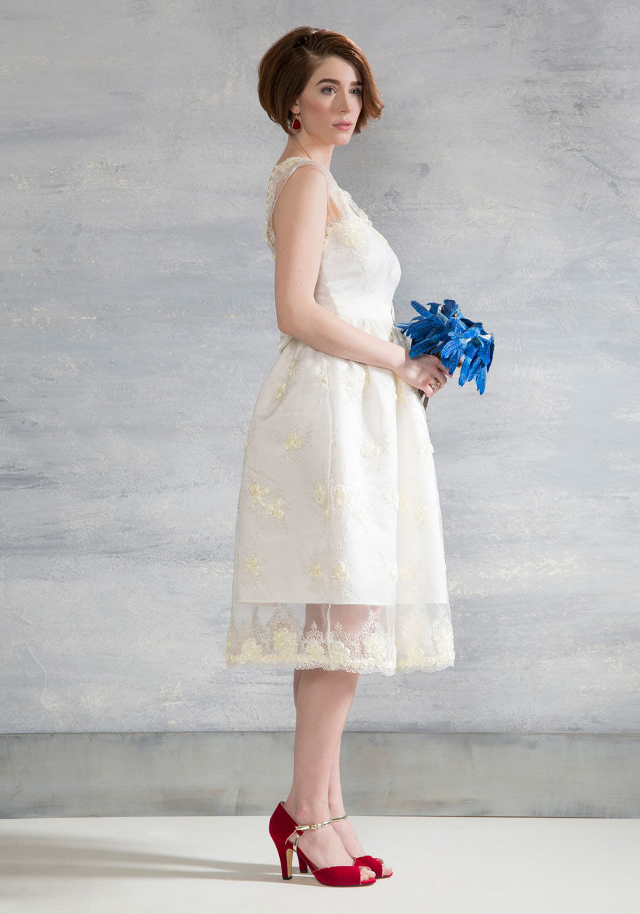  - In this white midi from Bettie Page by Heart of Haute, you&rsquo;ll not only be enveloped by the affection of the day, but also